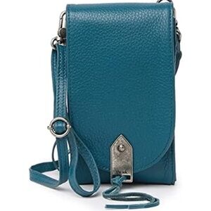 The Sak Leather Playa Phone Crossbody Bag 
teal color. In new like condition.